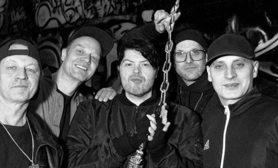 BROOK, all five band members together in a black and white group portrait